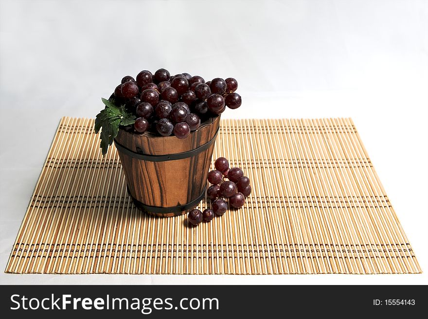 Grape In Wooden Basket