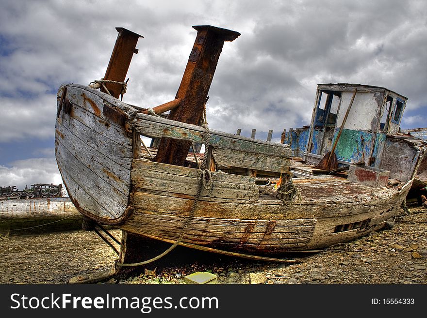 A boat in a marine cemetery in Rostellec in Britain in France. A boat in a marine cemetery in Rostellec in Britain in France