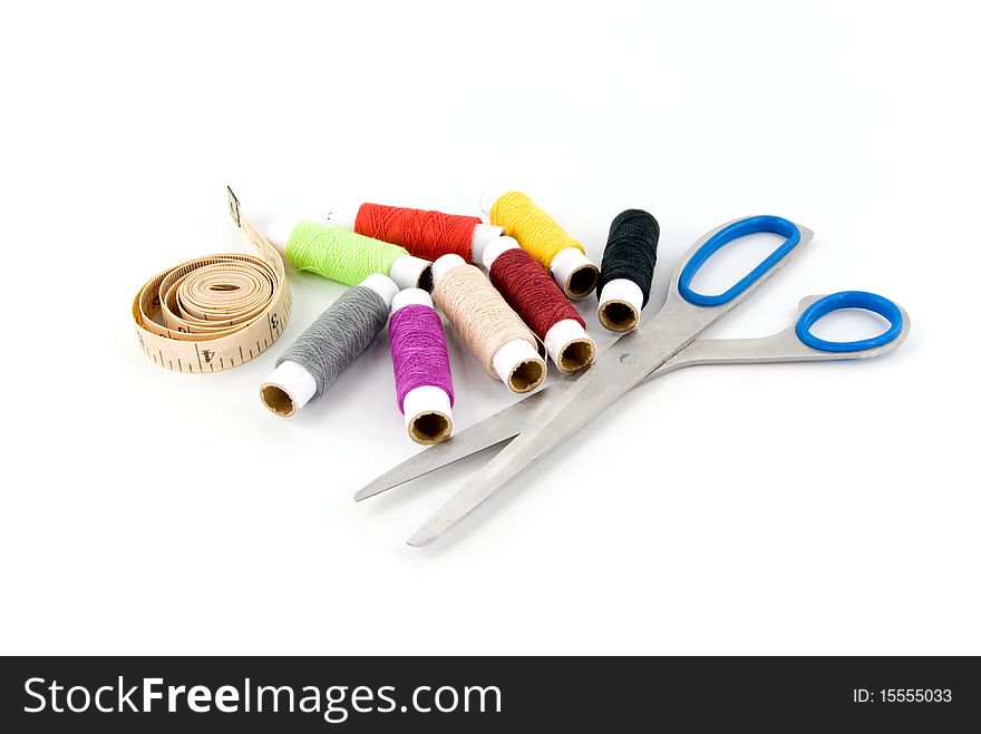 Group of spools of thread on white background