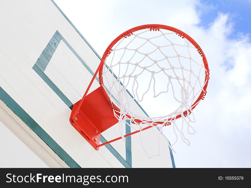 Basket hoop over the blue sky. Basket hoop over the blue sky