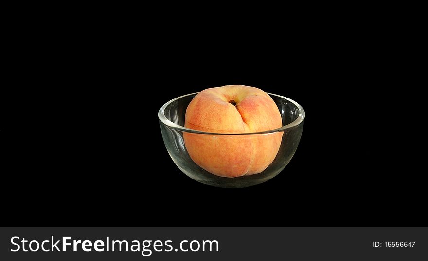 Big ripe peach in a vase