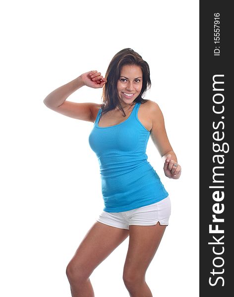 Pretty young woman dancing wearing a teal tank top