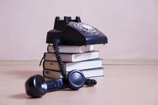 Stack Of Books With Vintage Telephone On Top Royalty Free Stock Photography Stack Of Books With Vintage Telephone On Top Royalty Free Stock Photography