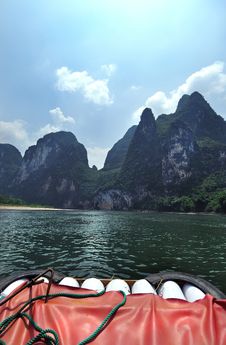 Bamboo Raft And Peaks, Li River Stock Photo Bamboo Raft And Peaks, Li River Stock Photo