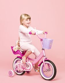 Girl On Her Bike Royalty Free Stock Image Girl On Her Bike Royalty Free Stock Image