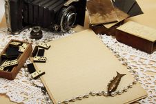 Empty Sheet, Retro Camera And Antique Domino Stock Image Empty Sheet, Retro Camera And Antique Domino Stock Image
