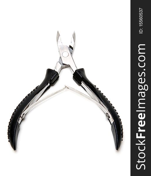 Manicure scissors with black handle on white background