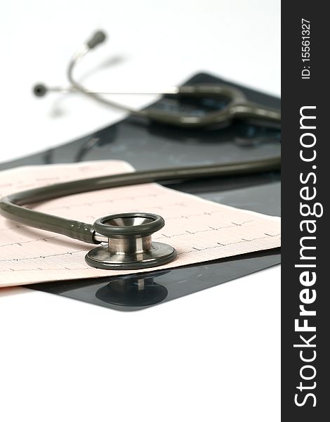Doctor's stethoscope and chart a patient's heart. Doctor's stethoscope and chart a patient's heart