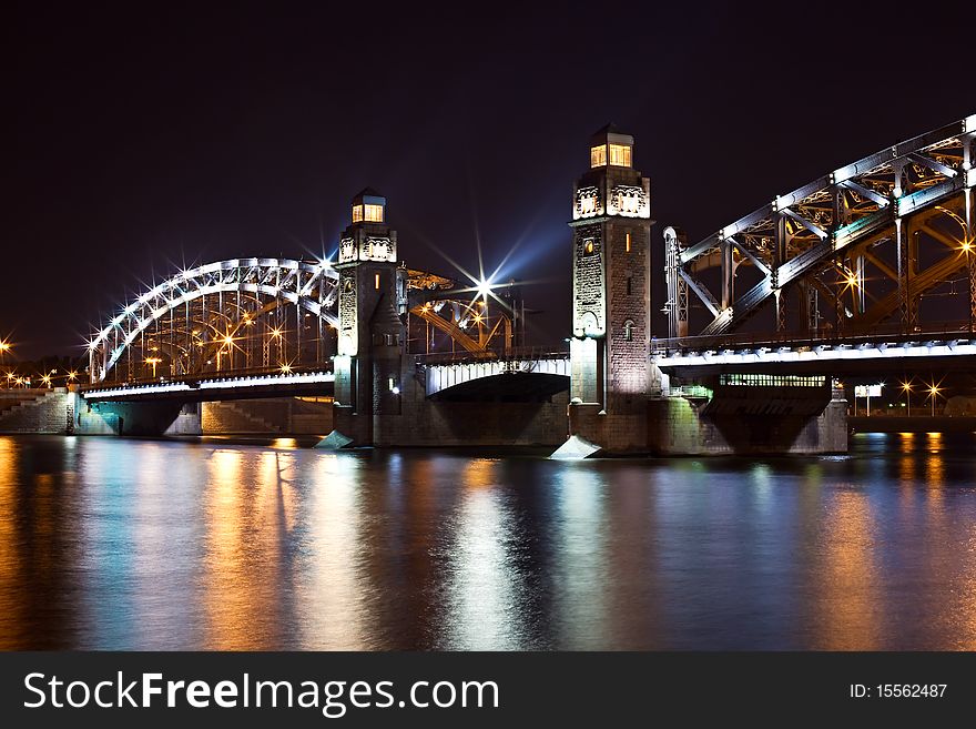 Bolsheohtinskiy bridge at night in St. Petersburg. Russia. Bolsheohtinskiy bridge at night in St. Petersburg. Russia