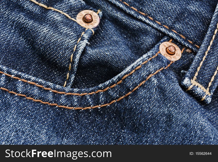 Macro pocket detail of blue denim jeans
