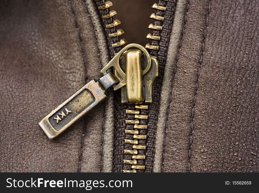 Macro of brown leather with zip