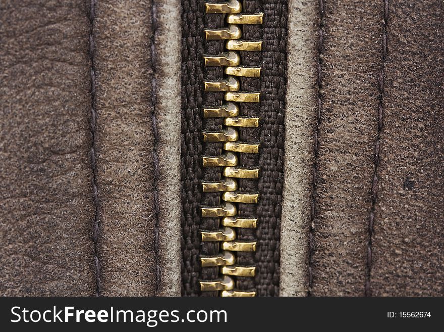 Macro of brown leather with zip