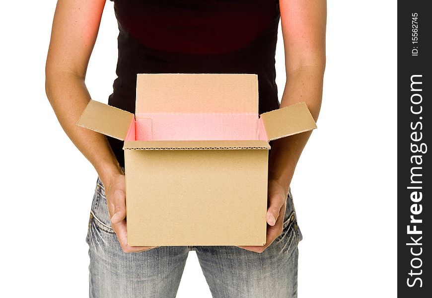 Woman holding a heavy cardboard box isolated on white background. Woman holding a heavy cardboard box isolated on white background