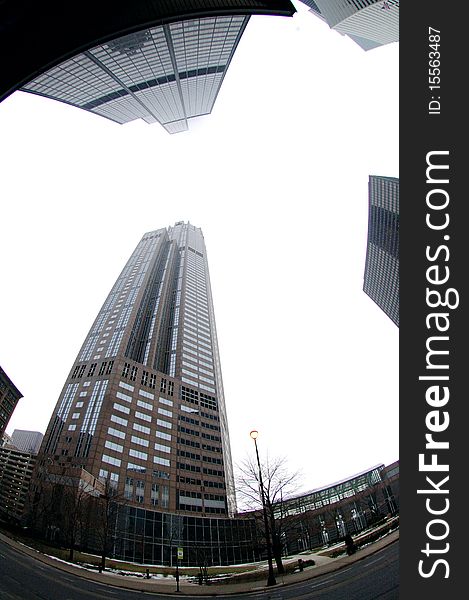 Fish eye view of Chicago skyscraper buildings in winter. Fish eye view of Chicago skyscraper buildings in winter