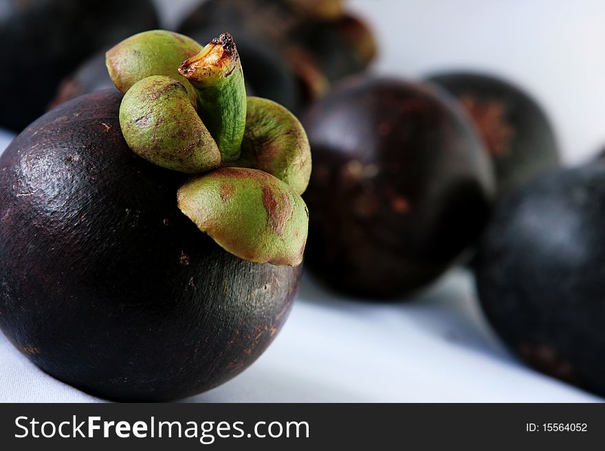 Mangosteen - tropical fruit, sweet and sour.