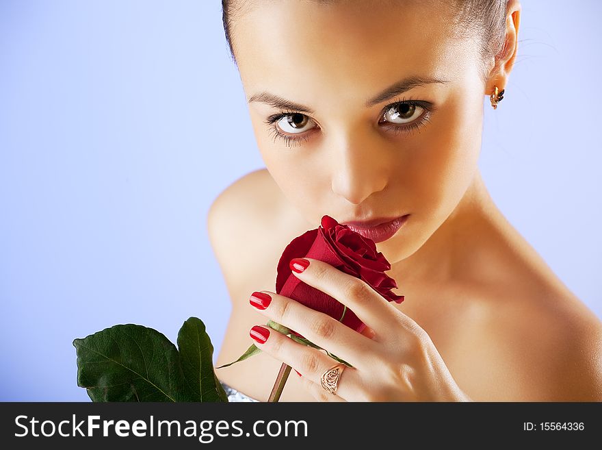 Portrait Of Sensual Beautiful Woman With Rose