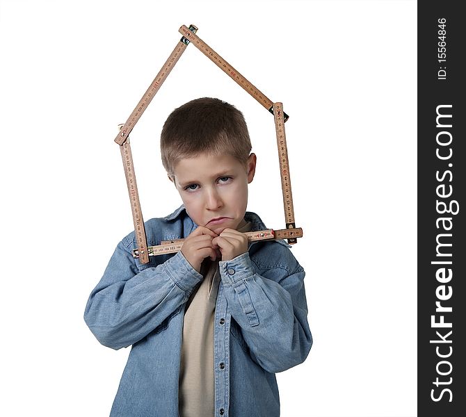 Portrait of young serious boy holding house-shaped measuring tape, studio shot isolated on white background. Portrait of young serious boy holding house-shaped measuring tape, studio shot isolated on white background