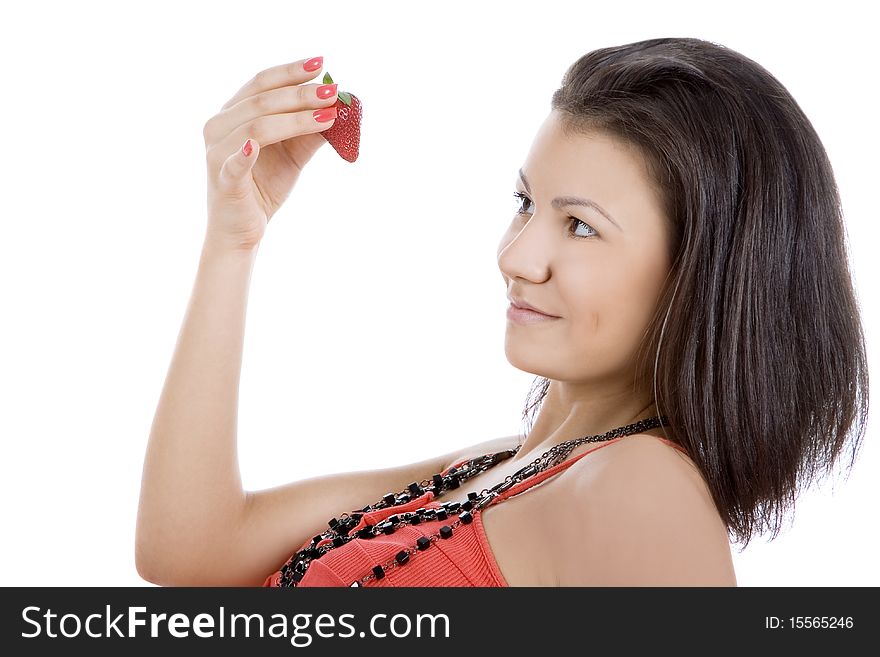 Portrait of beautiful young woman enjoy strawberry