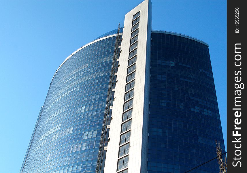 City business center against the blue sky