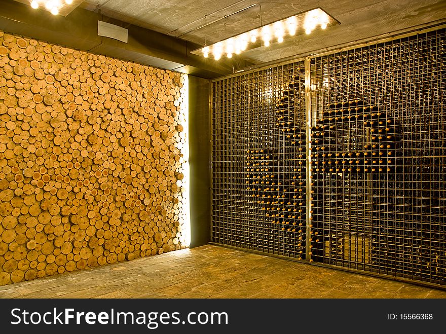 Stylish Wine rack with pattern and a complimenting wall.
