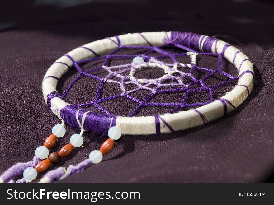 Dreamcatcher -is a handmade object based on a willow hoop, on which is woven a loose net or web.