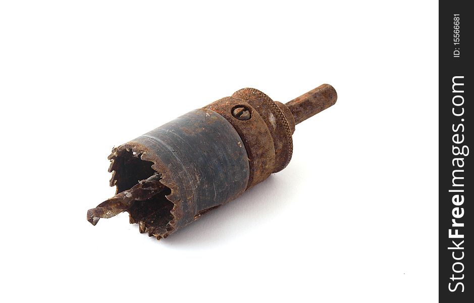 Old, rusty drill bit on a white background.