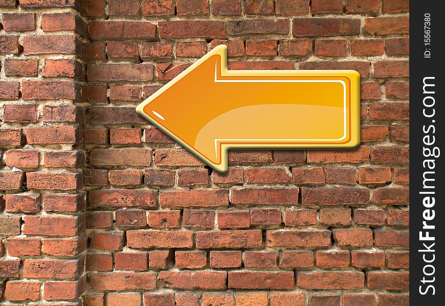 Yellow arrow on the wall brick