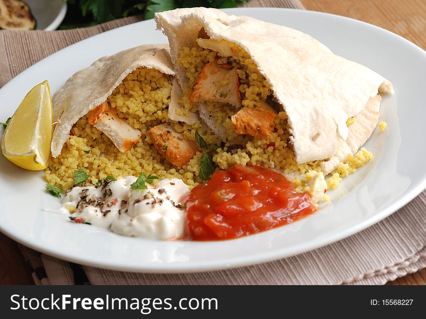 Pita with chicken and couscous