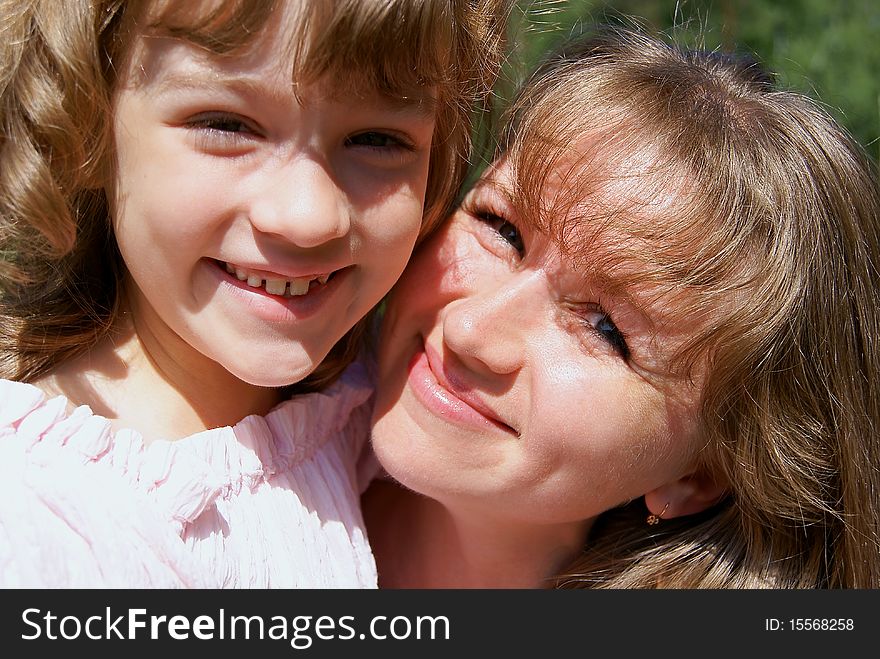 Happy family - the woman with the girl joyful. Happy family - the woman with the girl joyful