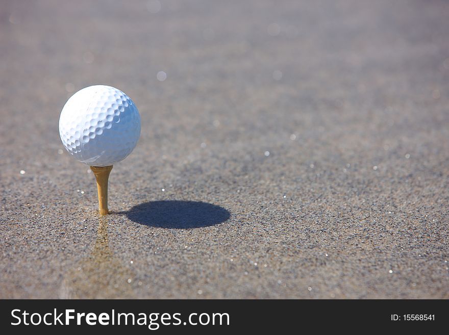 Golf ball in the beach