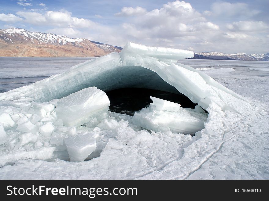 Unique snow formation resembling a shelter