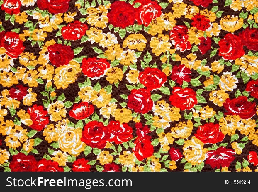 Colored cloth with bright flowers (rose), background