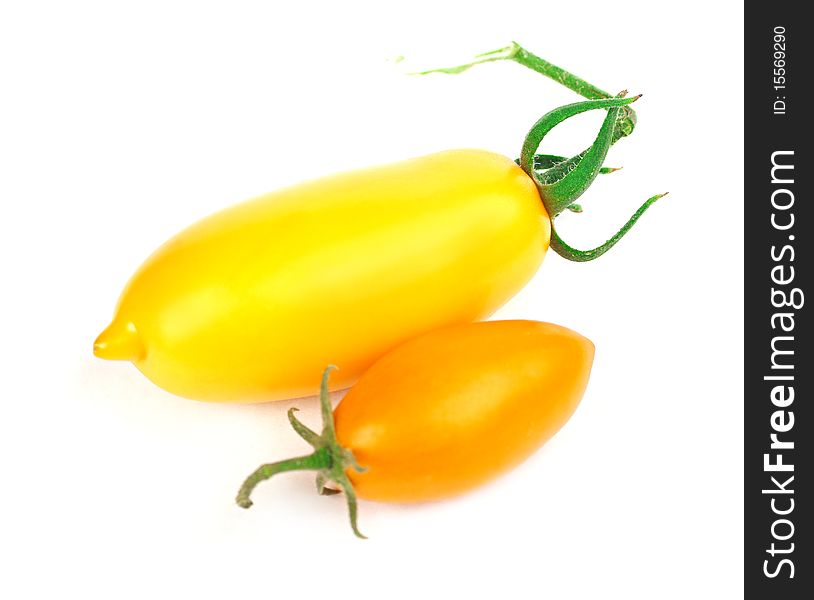 Selected yellow tomatoes isolated on a white background