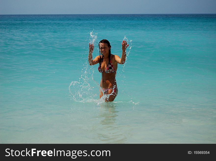 A girl in azure Adriatic waters of Montenegro. A girl in azure Adriatic waters of Montenegro
