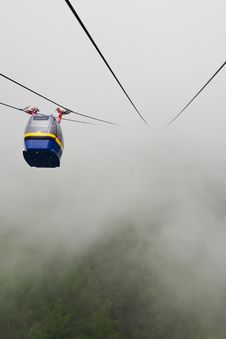 Cableway In Fog Royalty Free Stock Photo