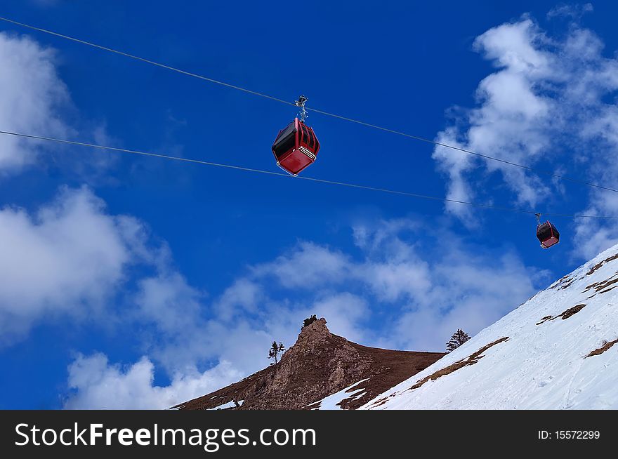 Red cable car on snow mountain, Chamrousse, France