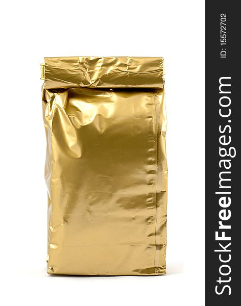 Studio shot of the golden tea pack isolated on white