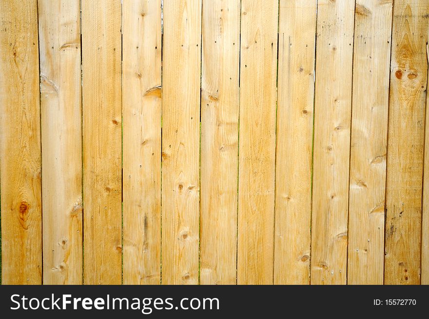 Vertical wooden planks showing texture and grain. For textures, backgrounds and abstract concepts.