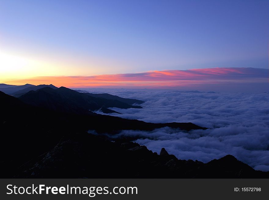 Scenery of sea clouds on the top of the mountains at sunrise. Scenery of sea clouds on the top of the mountains at sunrise