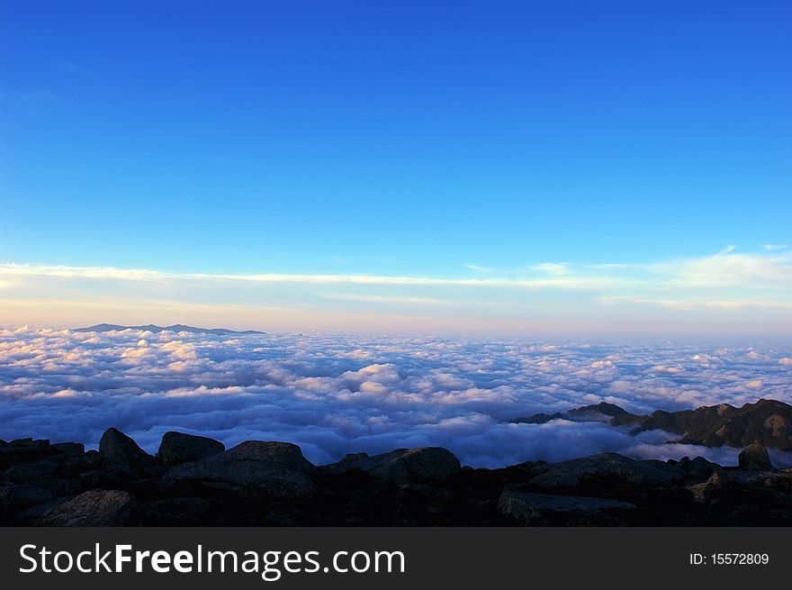 Scenery of the sea clouds on the top of mountains at sunrise. Scenery of the sea clouds on the top of mountains at sunrise
