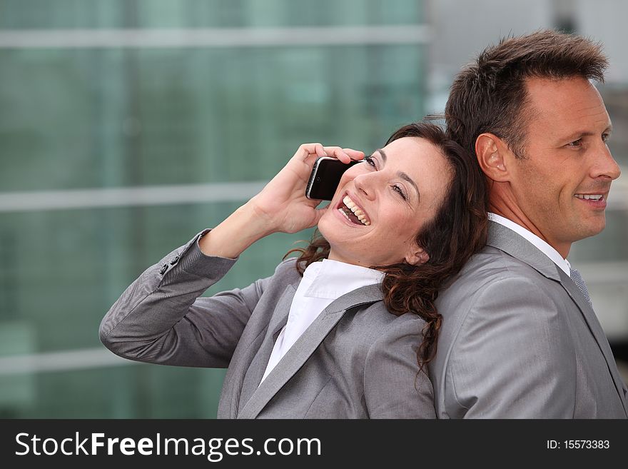 Business partners with mobile phone. Business partners with mobile phone