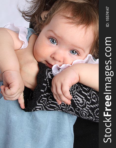 Small child at the hands of his mother and pointing. Small child at the hands of his mother and pointing