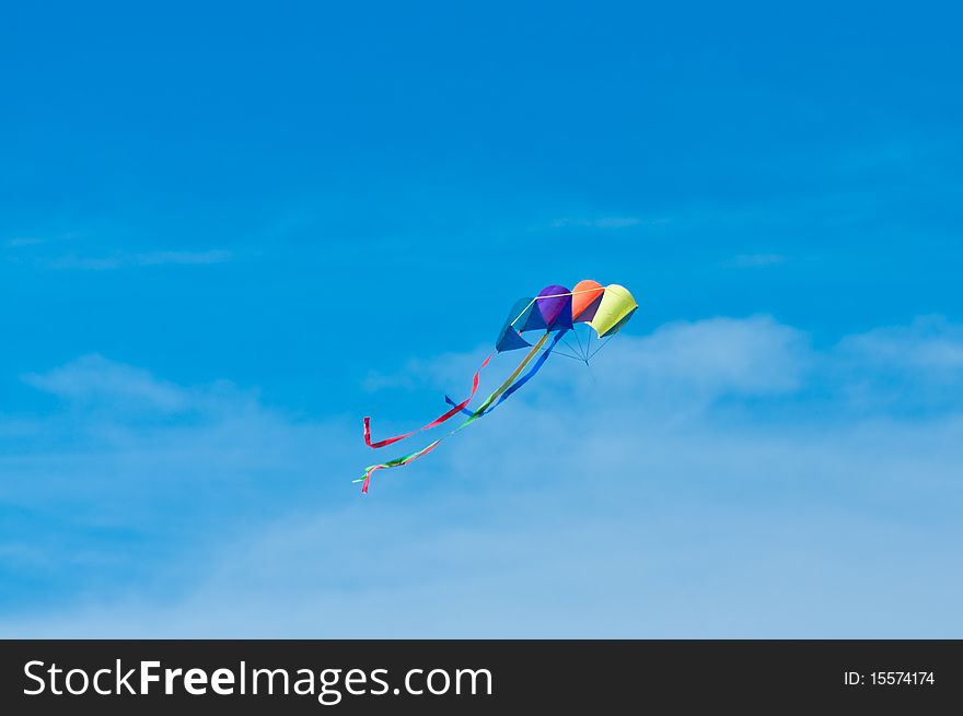 Colourful kite with ribbon flying in the air. Colourful kite with ribbon flying in the air