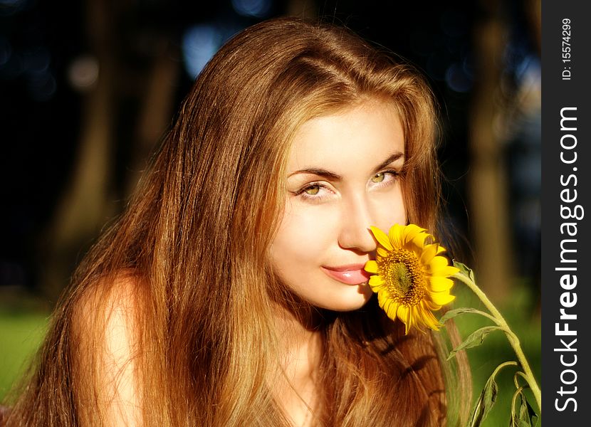 Beautiful girl with yellow flower. Beautiful girl with yellow flower