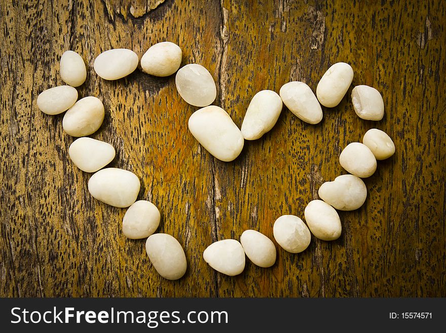 Heart on the wood background