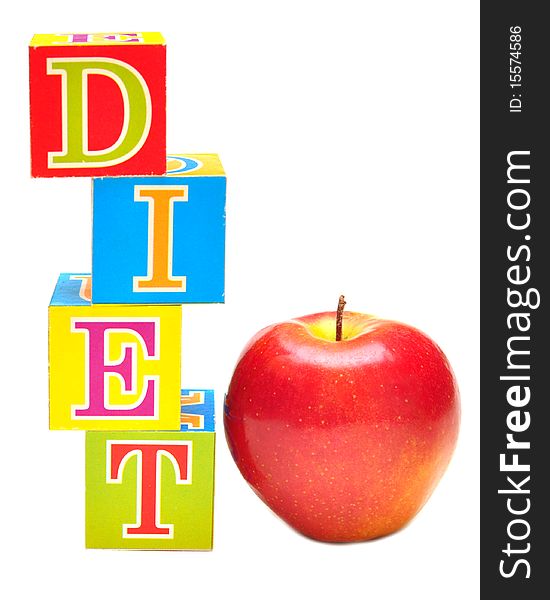 Red apple and cubes with letters - diet