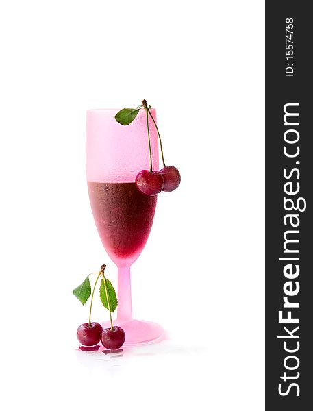 A glass of cherry juice on a white background