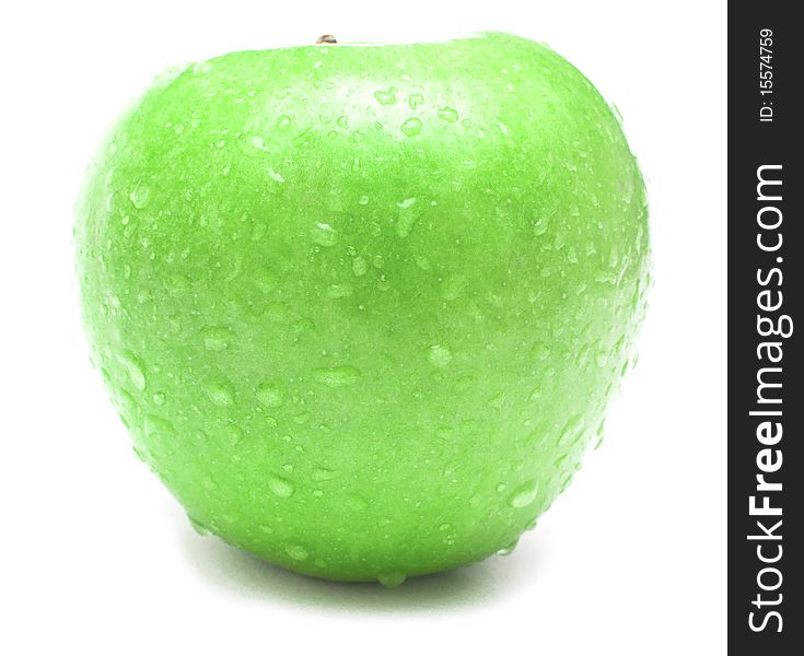 Wet green apple covered by water drops on white background. Isolation