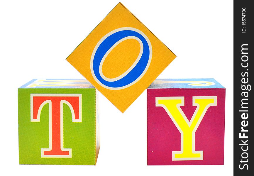 Word toy spelled out in baby blocks isolated on white. Word toy spelled out in baby blocks isolated on white