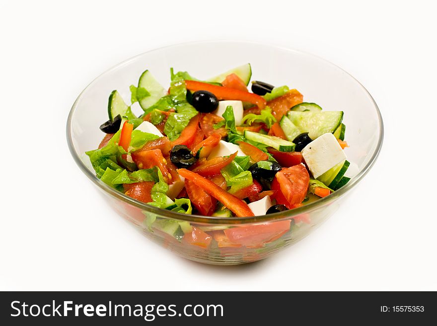 Appetiny Greek salad in a glass bowl